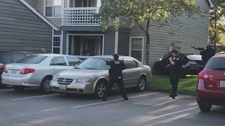 Beaverton police officers confronted by armed man while responding to crash at apartment complex