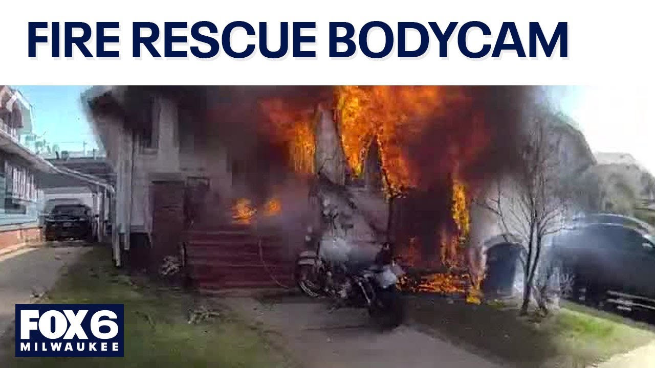 Racine officer rescues man, dogs from house fire | FOX6 News Milwaukee ...