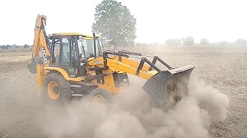 JCB Backhoe Making Drain and Loading in Mud Tractor - JCB Working Machine