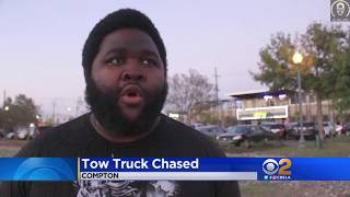 Tow Truck Drags Car While Owner Fights Back