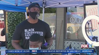 Local Barber Shop Moves Haircutting Outside