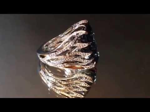 white gold ring with blue topaz 20,6ct and 220 diamonds