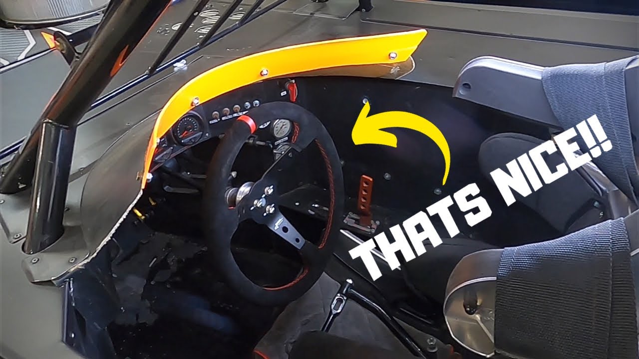 Bolting new parts on the racecar! New steering wheel