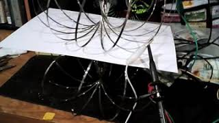 Hippy torus rings stacked on top of onr another each being fed 9 volts in different directions