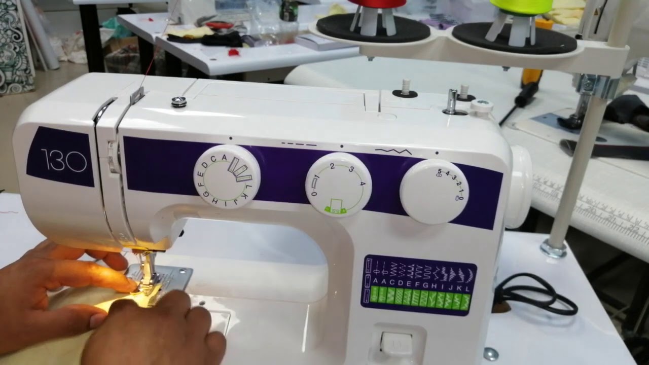 MAQUINA DOMESTICA MARCA ELNA 130. ESPAÑOL