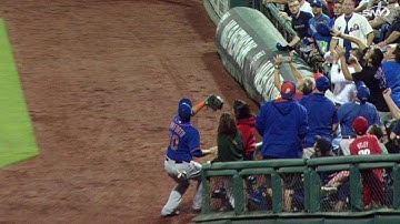 NYM@PHI: Conforto reaches into stands to make catch