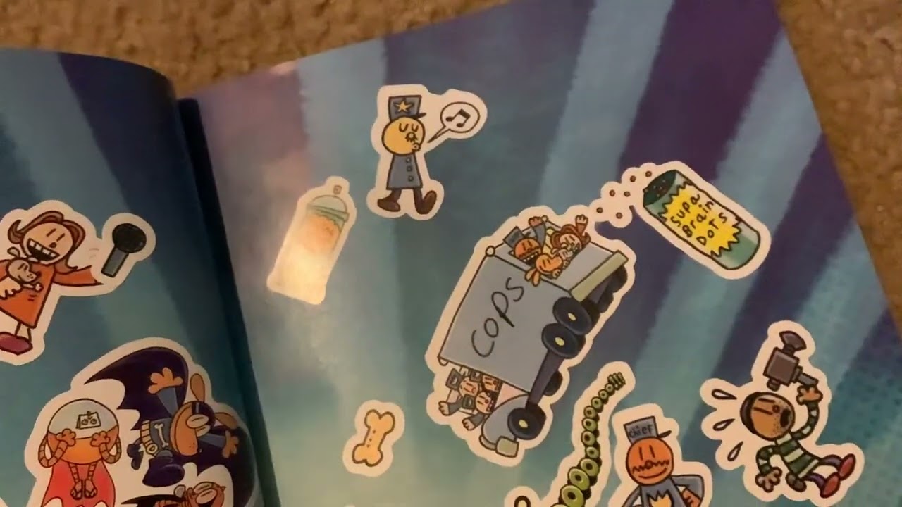 Looking at dog man sticker book