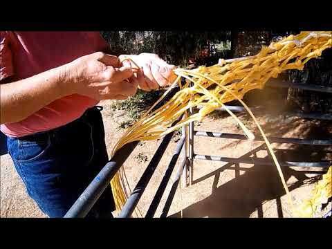 Tying a Hay Net Using Baling Twine