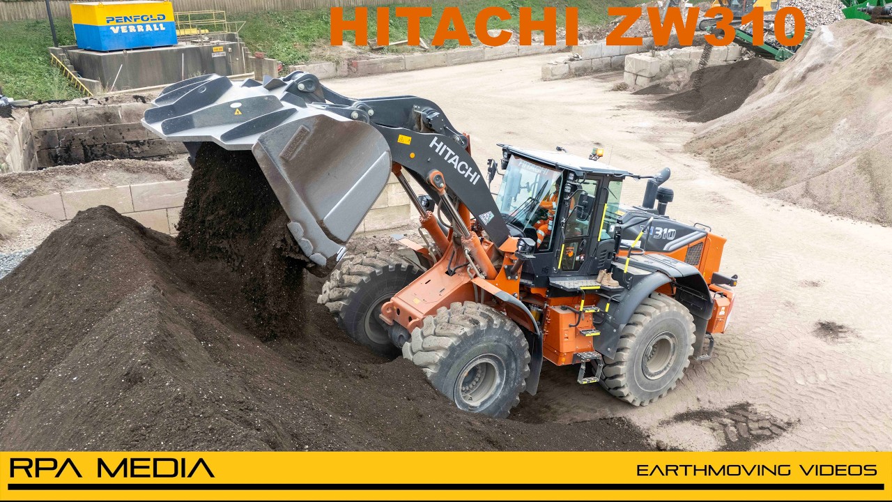 Hitachi ZW310 working in a recycling yard.