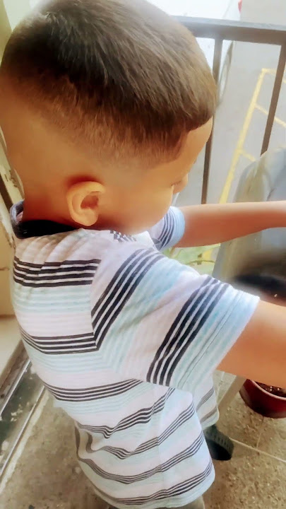 6 year old boy cutting AloeVera plant. #garding #kids #educate #garden #plants #seeds #young