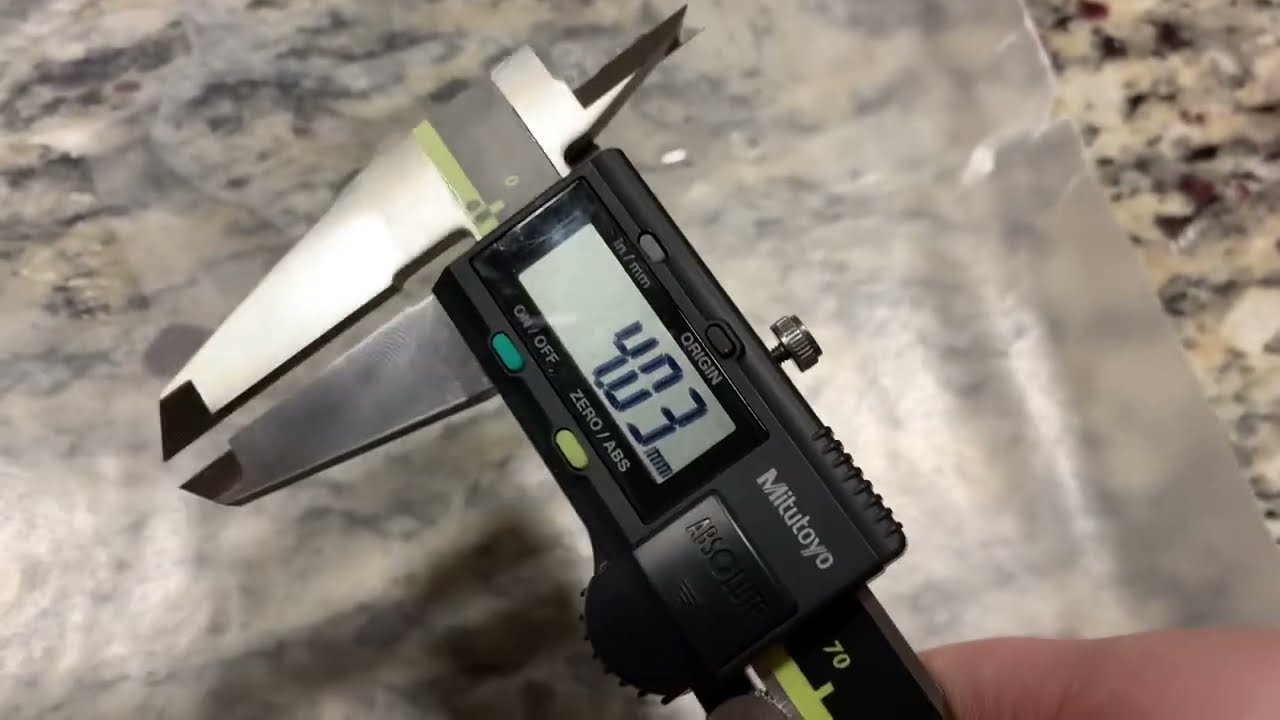 Measuring the Size of a Water Molecule with Household Items