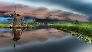 Epic Shelf Cloud Moves Over World Protected Windmills