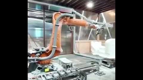 KUKA Robot with robot track for engraving application