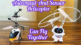 Astronaut And Electric Motor Helicopter Together Flying Experiment