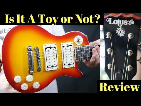tiny-guitar---a-toy-or-not?-vintage-lotus-mini-"les-paul"-|-review-+-demo