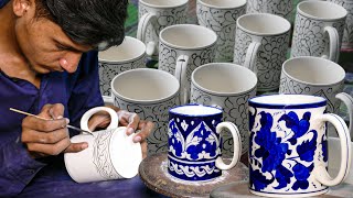 From Clay to Art: A Blue Pottery Artist Demonstrates His Skills on Porcelain Mug