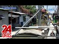 Poste ng kuryente sa gitna ng sapa, pinangangambahan magdulot ng aksidente | 24 Oras