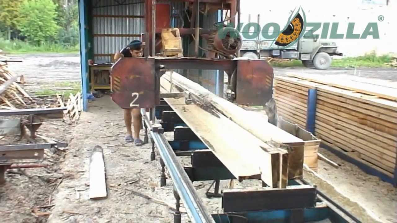 Sawing of fir / spruce logs with a band sawmill Exports of timber