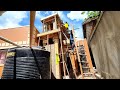 USING RAIN WATER THROUGH THIS TANK STAND TO RENTAL HOUSES 