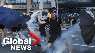 Hong Kong protests continue as police use tear gas to disperse crowds