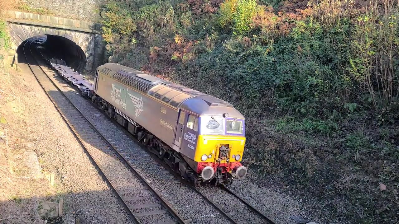 Angle 2 - A rare sight for this line! A DRS class 57 on a Tesco working