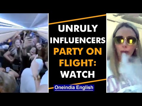 Influencers party on flight without mask, airline abandons them: Watch | Oneindia News