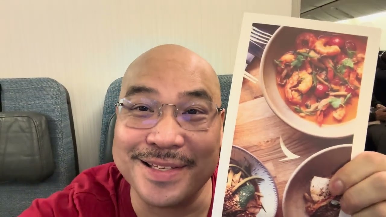 Flying with CATHAY PACIFIC Economy to Manila