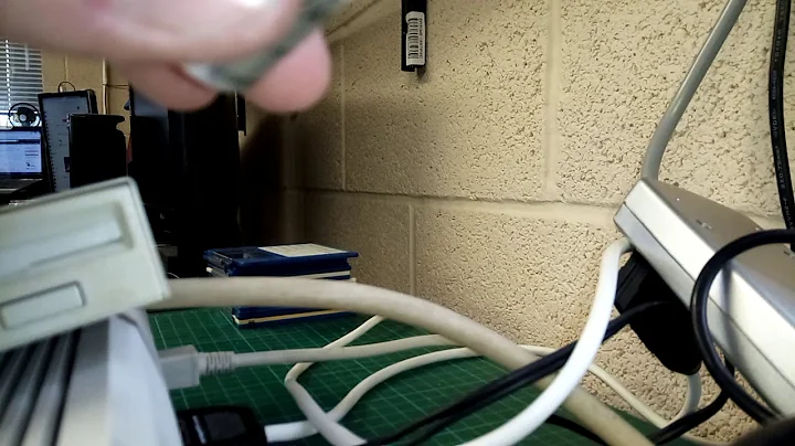 Cleaning Amiga disk drive heads with cotton bud