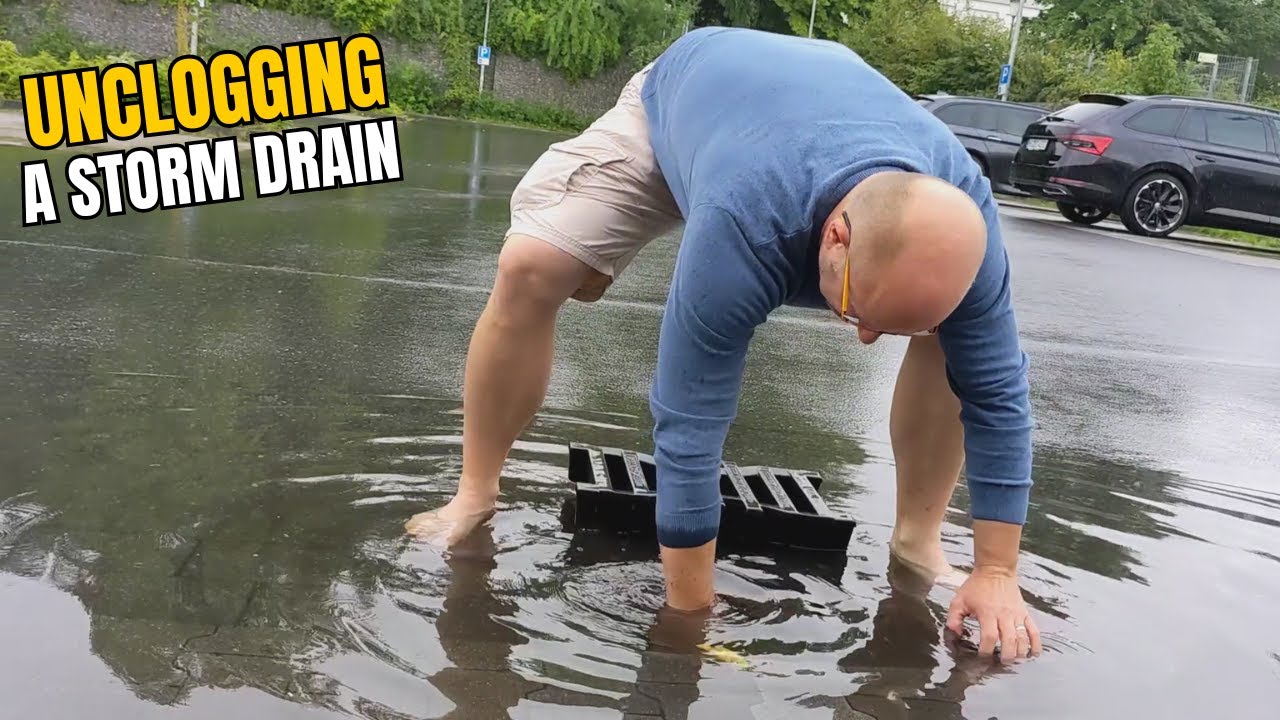 #002 Unclogging a storm drain after rain in Germany - YouTube