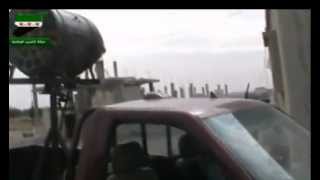 Syrian rebels equipped with missiles fire on targets in Homs