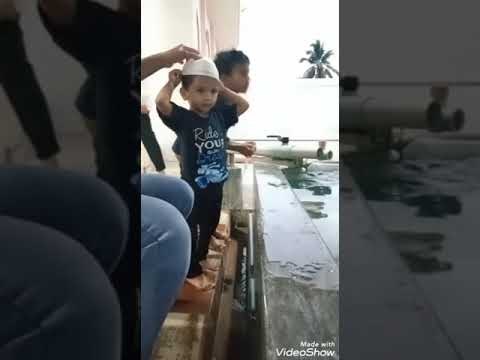 Toddler Doing Wazu Ablution