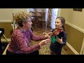 Ada has a violin lesson with Grandmother