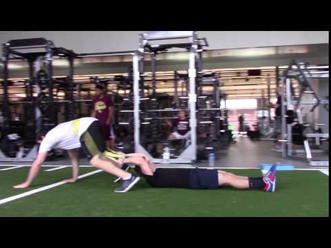Partner bear crawl with strap