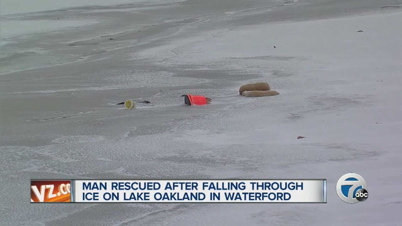Man rescued after falling through the ice - YouTube