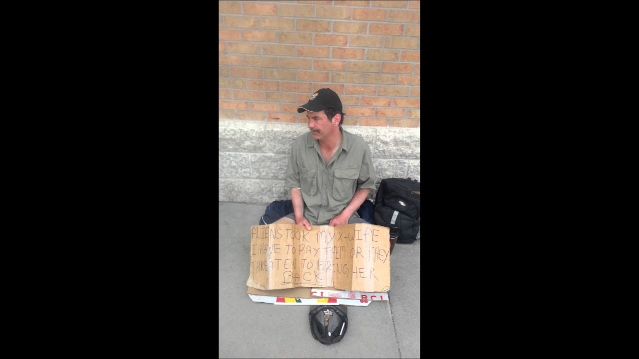 Homeless Guy Pan Handling Downtown