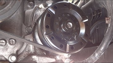 How to replace the compressor pulley in a 2009 Toyota corolla