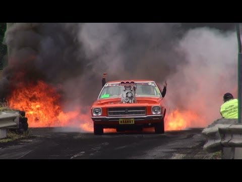 BLOWN V8 HOLDEN HQ ( KRANKY ) CATCHES FIRE IN THE BURNOUT FINALS AND LIGHTS UP KANDOS. MORE VIDEOS TO COME.