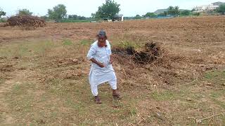 Borewell hole point divining using neem stick.9880988831.8884387270