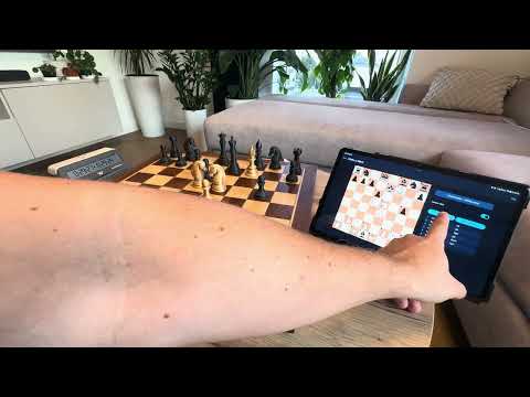 Demo video: a move played on the real board appears in the app, then gets replayed and analyzed
