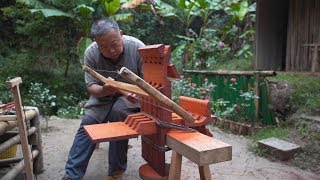 Grandpa Amu made a combination of Luban table with a piece of wood.
