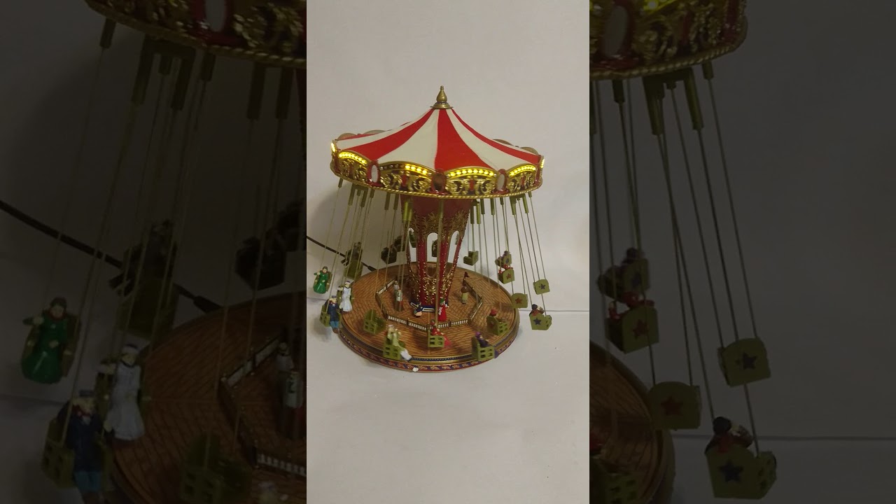 Mr Christmas swing carousel - YouTube