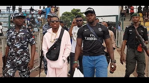 After his Arrest,Small Doctor storms in fully body-guard by police at his Omo better concert