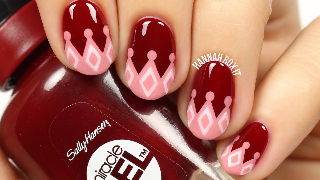 1. "Cute Crown Nail Design with Glitter Accents" - wide 1