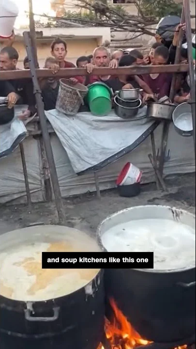 People fight for scraps of food in Gaza