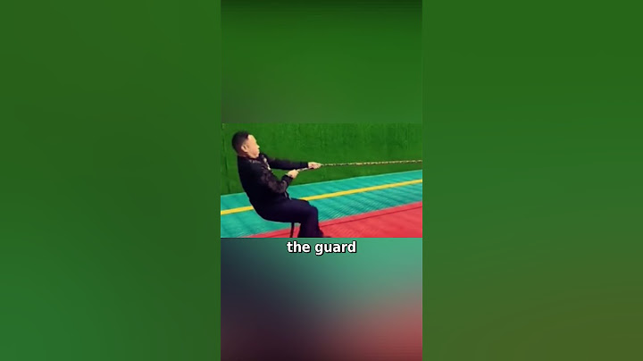Security Guard Falls to Children's Team in Tug-of-War