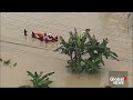 At least 14 dead, dozens rescued after floods, landslides sweep Indonesia’s south