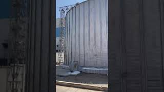 Grain Storage Silo Of 12500 Mt Capacity. Air Blower At Bottom. Fumigation Of Silo With Alp.