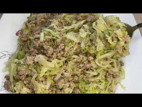 Video: Nqaij Npuas Nrog Stewed Cabbage