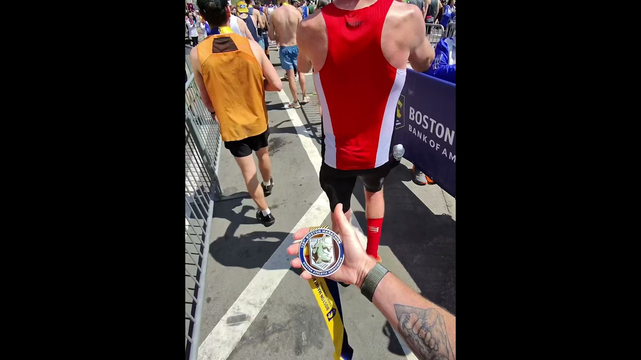 Boston marathon finish medal first person view 