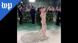 Jennifer Lopez poses on Met Gala carpet